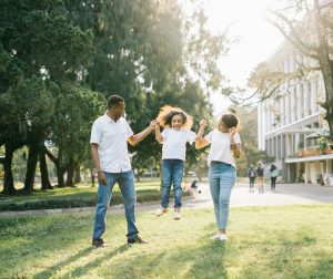 family playing in the park
